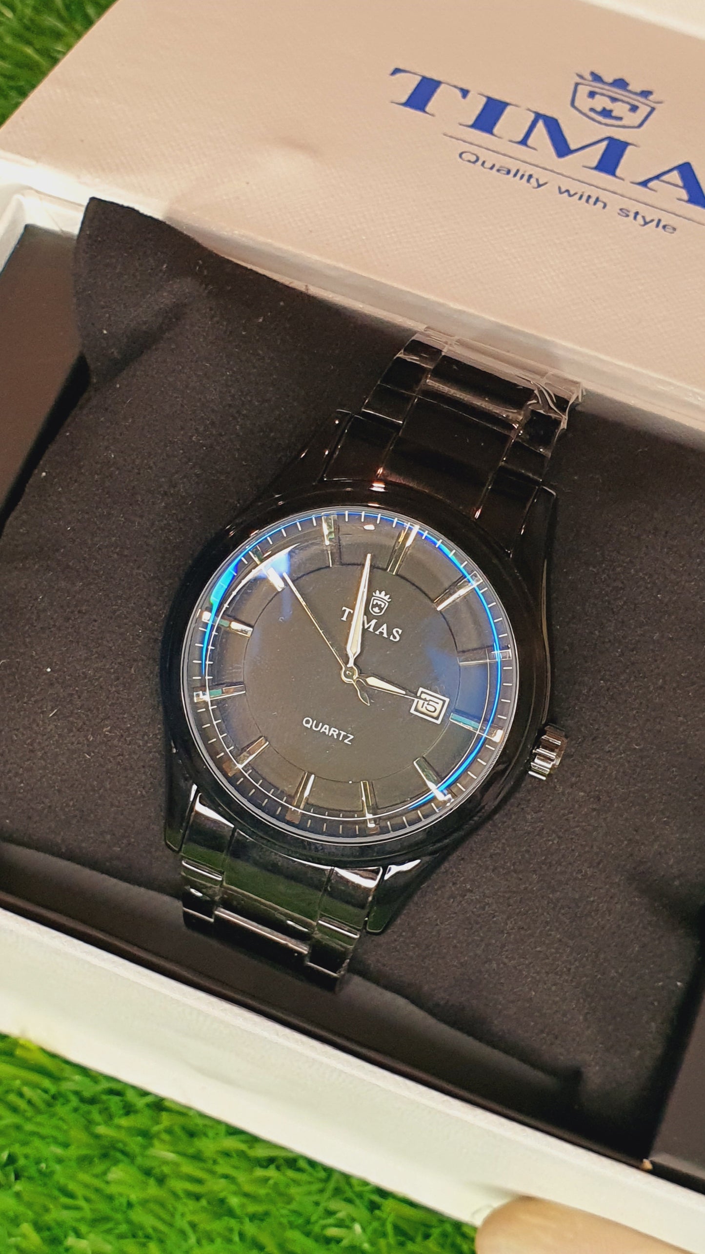 TIMAS Men's Black Metal Bracelet Watch with Iridescent Dial